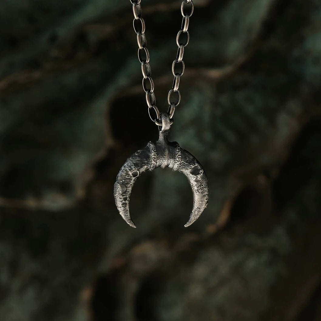 Crescent Moon Silver Necklace with Lunar Crater Design