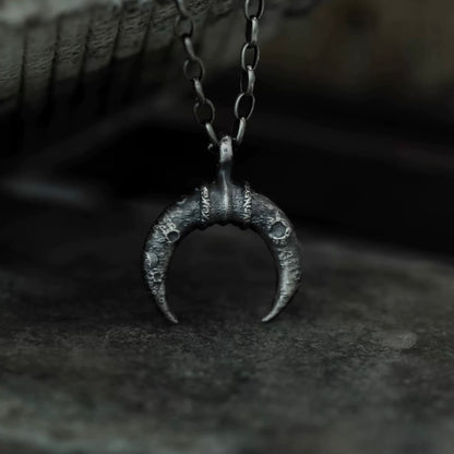 Crescent Moon Silver Necklace with Lunar Crater Design