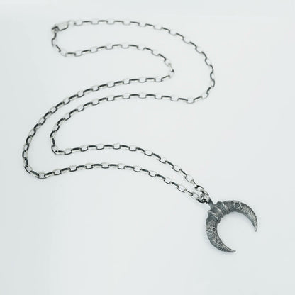 Crescent Moon Silver Necklace with Lunar Crater Design